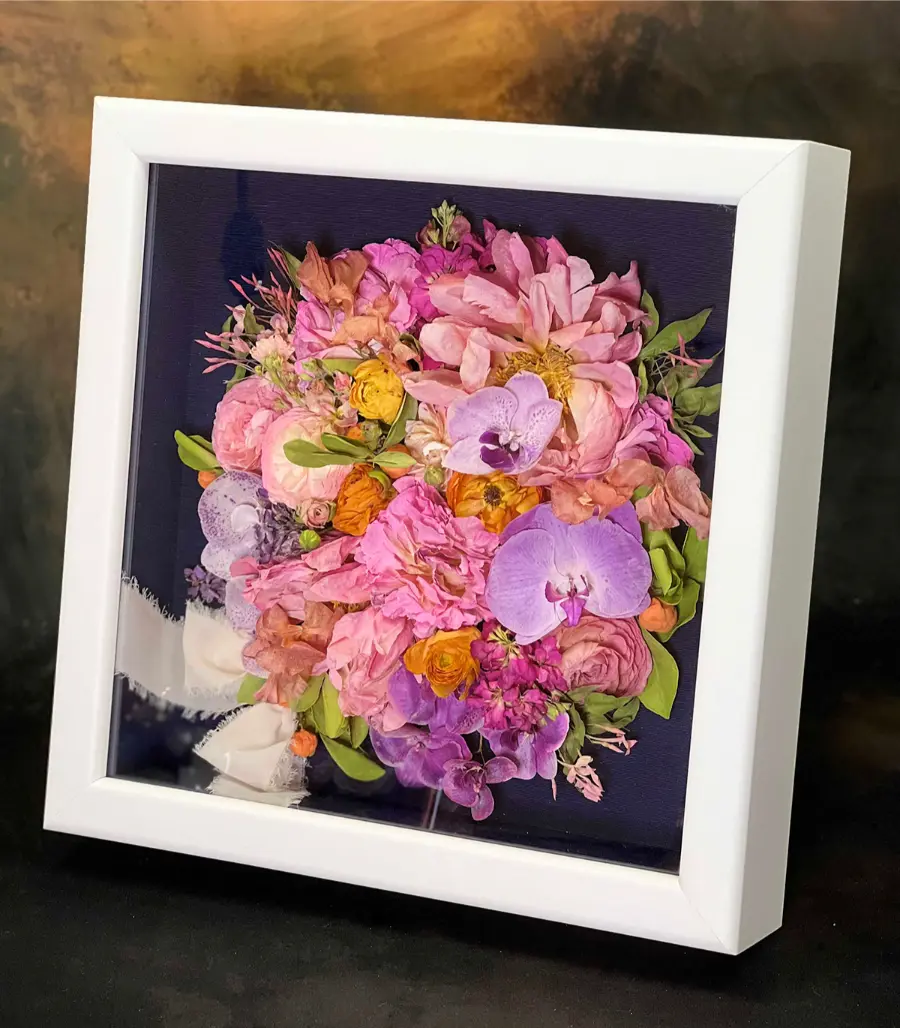 pink flowers preserved in shadow box